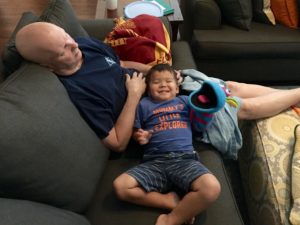Pa asleep after playing with the kids